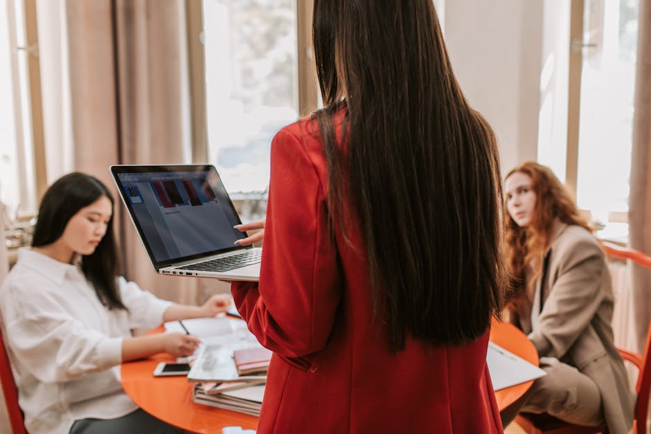 career coach reviewing paid group subscription dashboard for content monetization