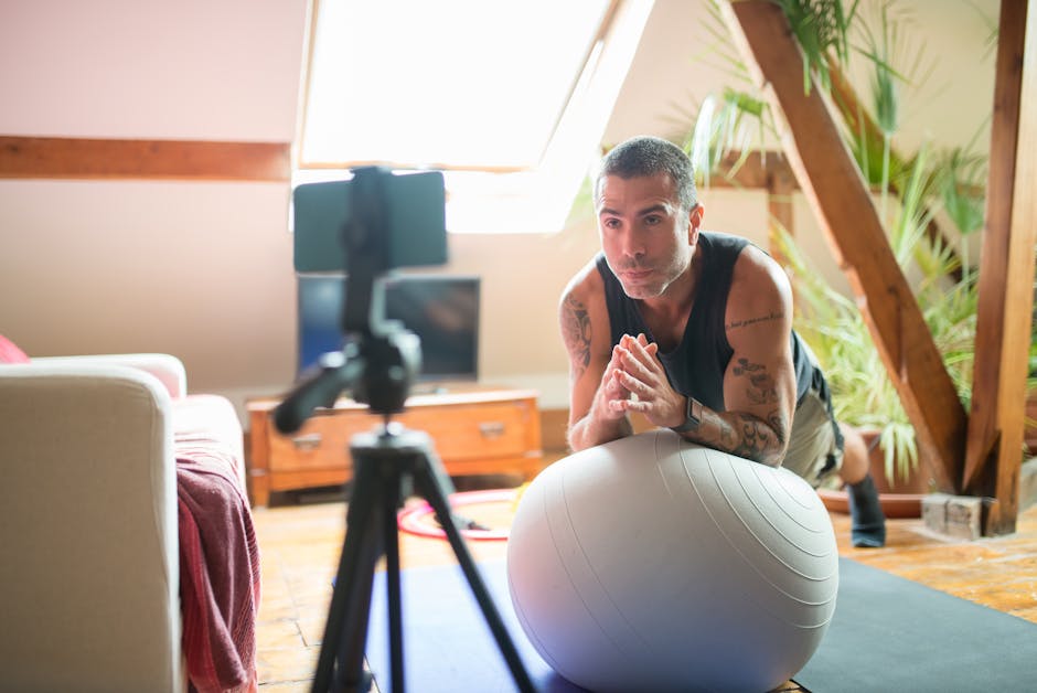 fitness influencer recording a workout video at home studio