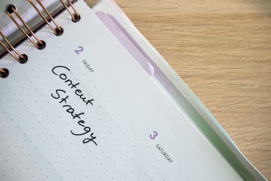 creator writing 7-day challenge content plan notebook on desk