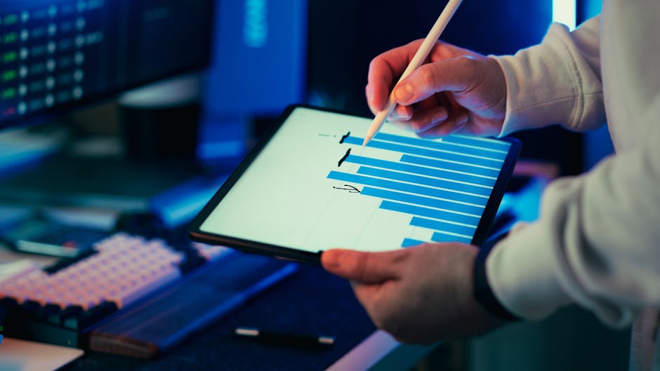 mindset coach reviewing analytics dashboard on tablet