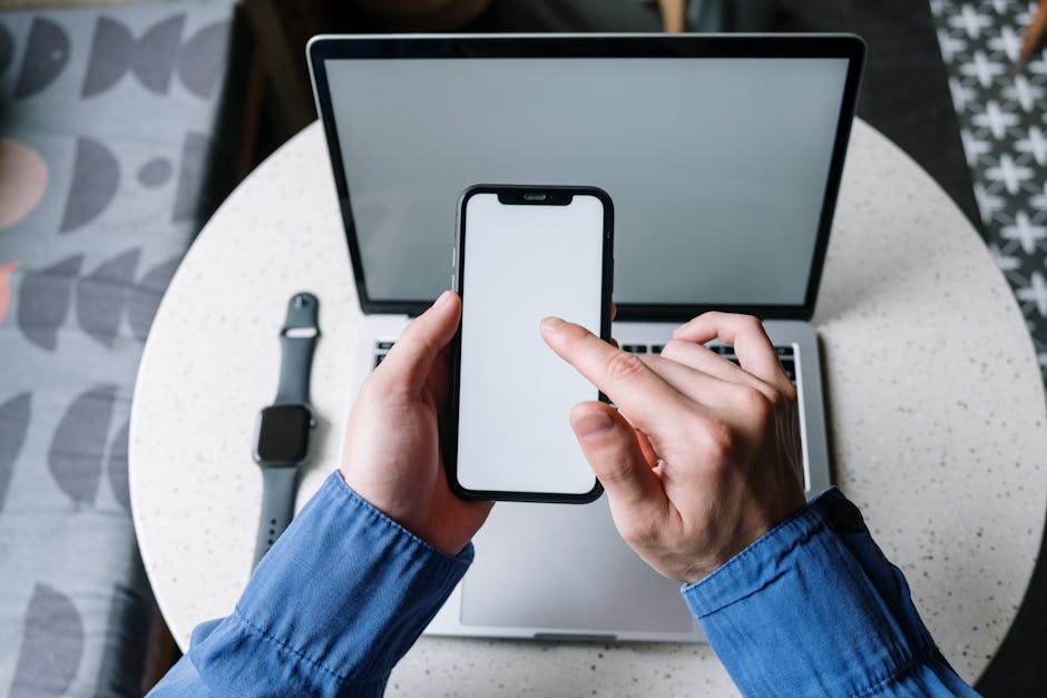 Online Challenge Marketing Strategy: The Essential 2026 Playbook for Coaches 2 coach sending final launch day content on phone and laptop simultaneously