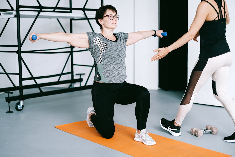 postnatal fitness coach demonstrating core exercise to camera